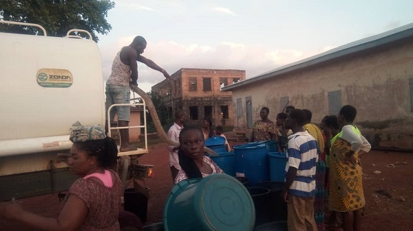 Distributing-water-to-community-members
